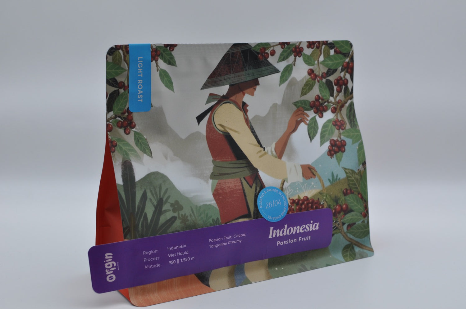 Angled view of an Origin Roastery Indonesia Passion Fruit light roast specialty coffee bag featuring an illustrated coffee farmer.